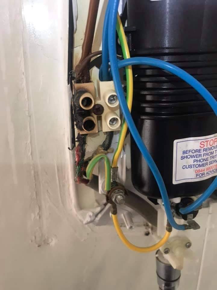 C1 - Danger Present Visible signs of thermal effects on shower final cabling connection.  Shower circuit wiring isolated and made safe at the clients consumer unit. - RR Electrical, Liverpool